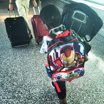Nolan insisted on carrying his booster carseat through the airport to be checked with our bags