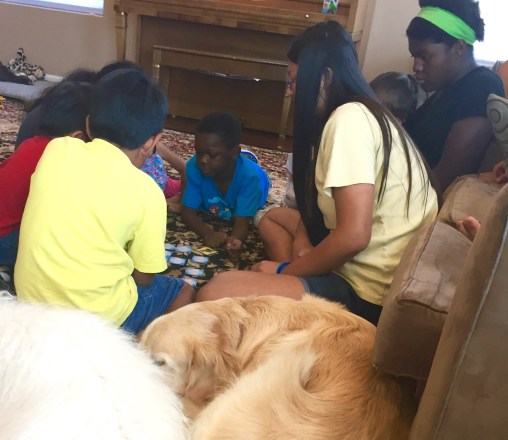 Playing a memory matching game with the other kids